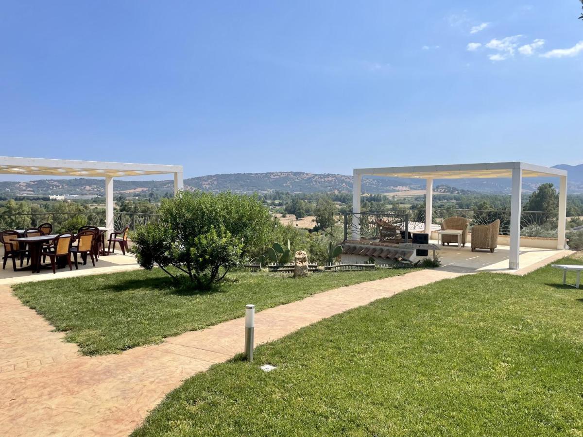 Hotel Essenza Di Mirto La Caletta Luaran gambar