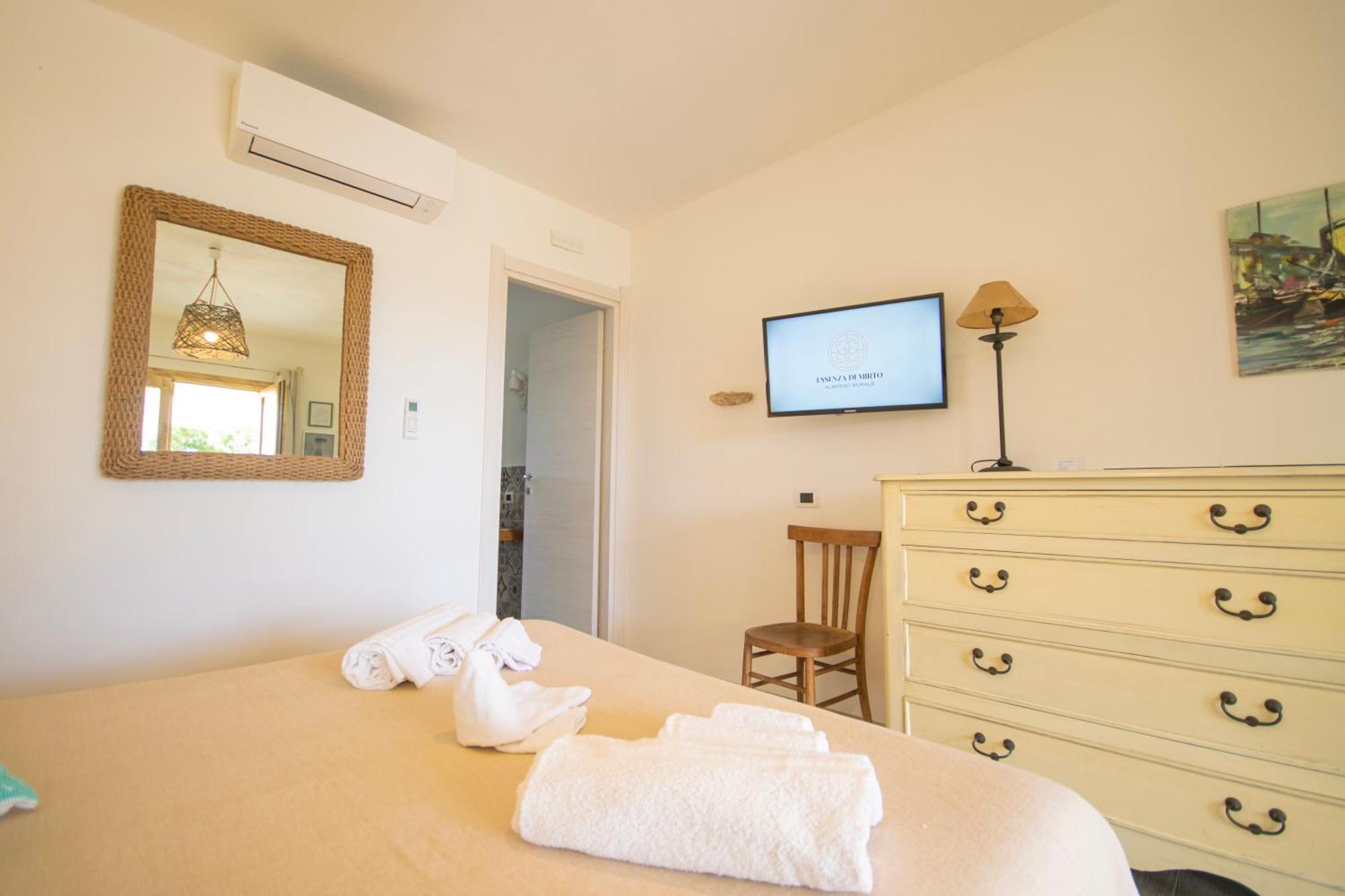 Hotel Essenza Di Mirto La Caletta Luaran gambar