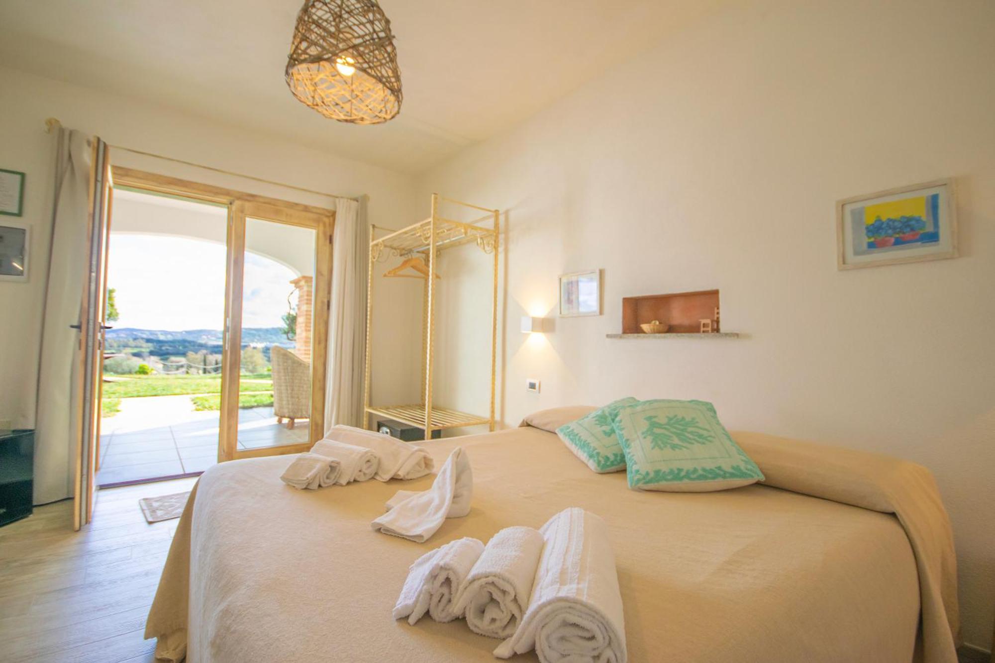 Hotel Essenza Di Mirto La Caletta Bilik gambar