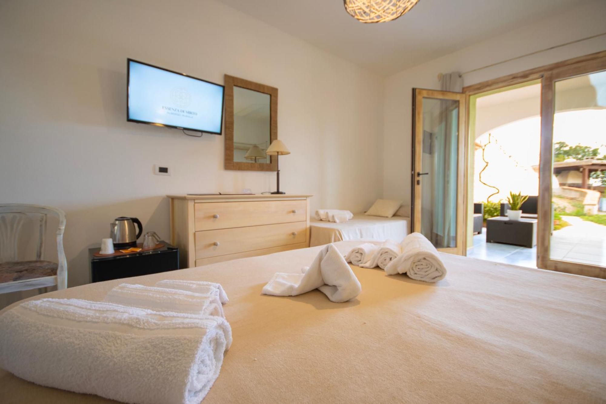 Hotel Essenza Di Mirto La Caletta Bilik gambar