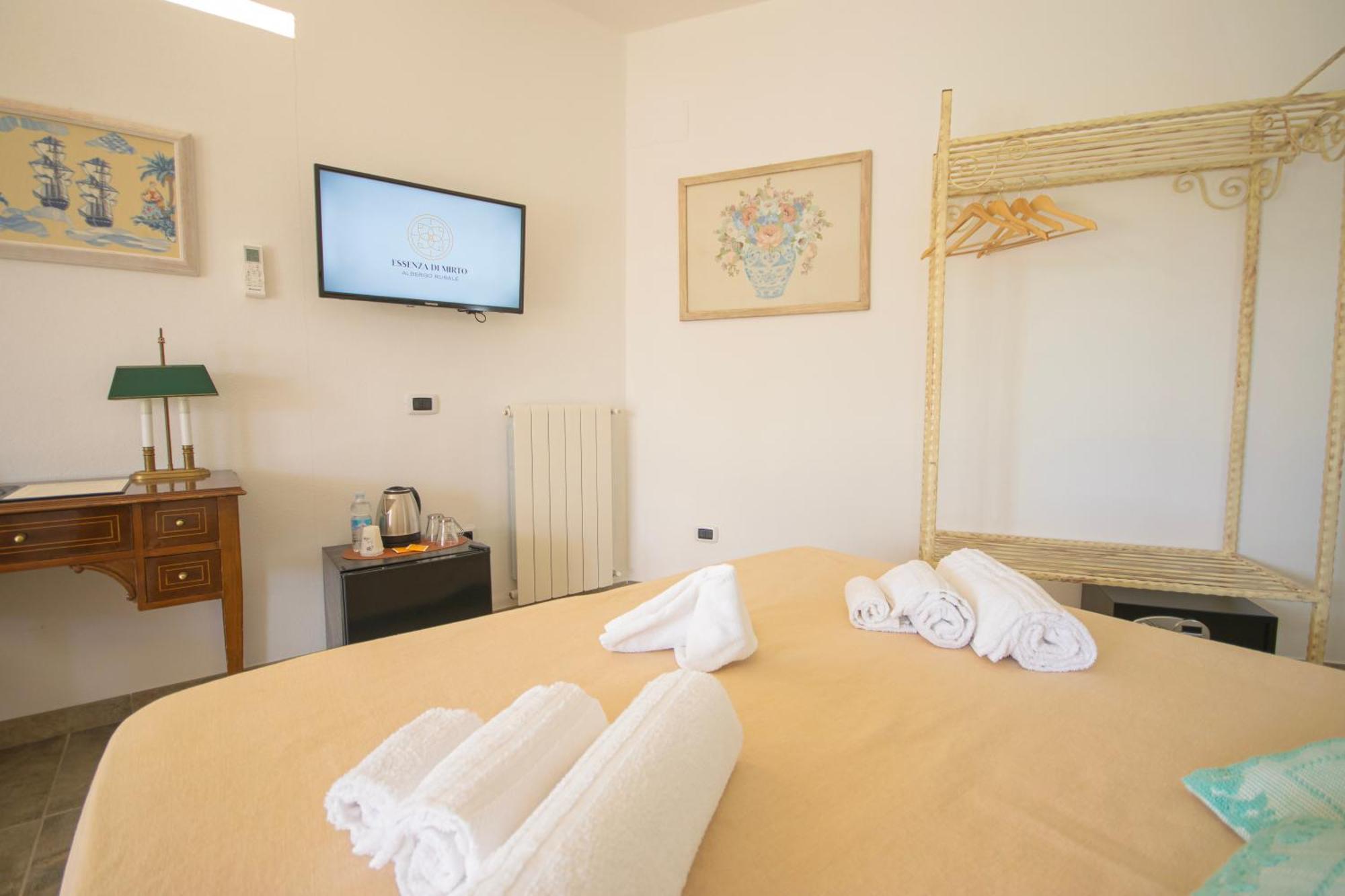 Hotel Essenza Di Mirto La Caletta Bilik gambar