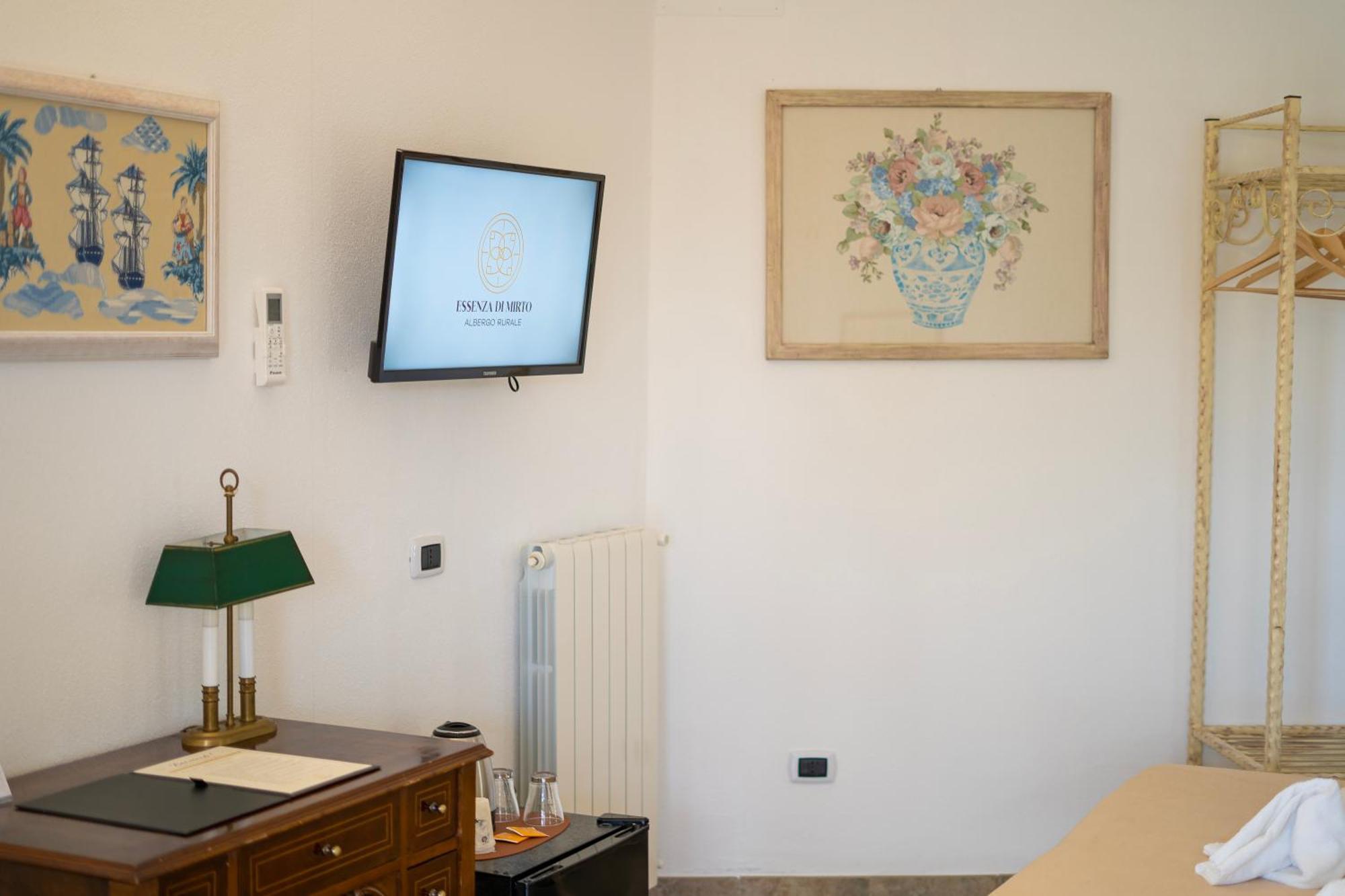 Hotel Essenza Di Mirto La Caletta Bilik gambar