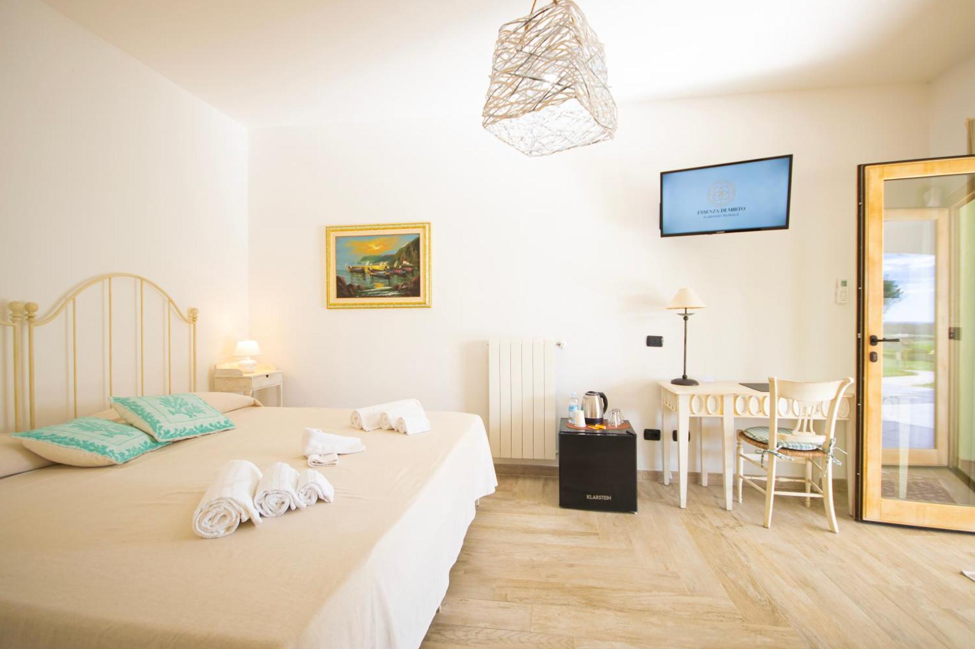 Hotel Essenza Di Mirto La Caletta Luaran gambar