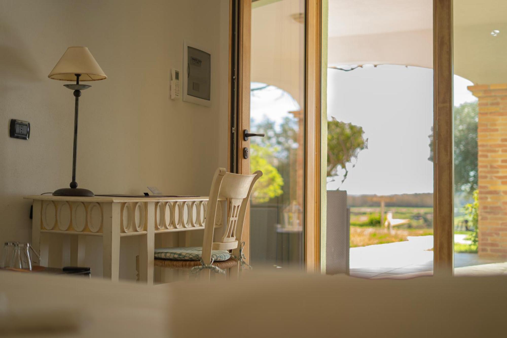 Hotel Essenza Di Mirto La Caletta Luaran gambar